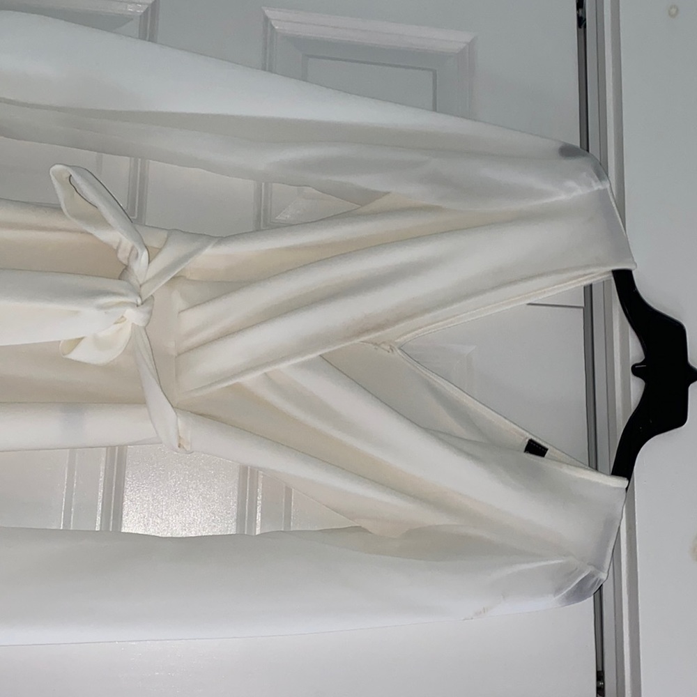 White pantsuit/ jumpsuit